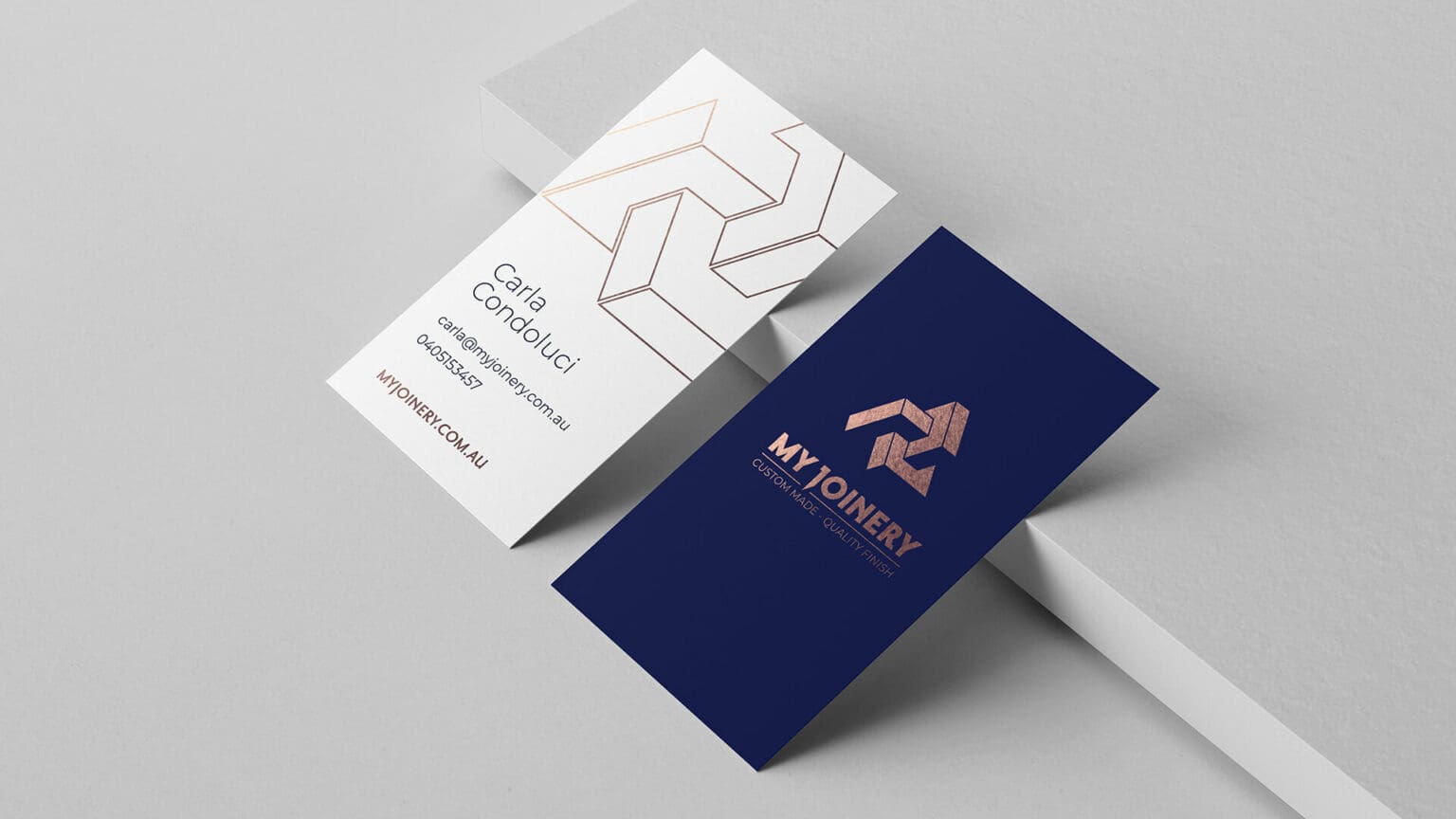 Business cards for My Joinery with a geometric logo, displaying contact information for Carla Condoluci and the company tagline ‘Custom Made. Quality Finish.’