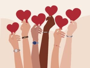 Illustration of diverse hands holding red hearts, symbolising community support and unity in giving.